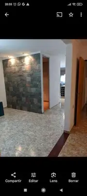 a view of a room with a stone wall at La Calera- Casa vacacional in La Calera