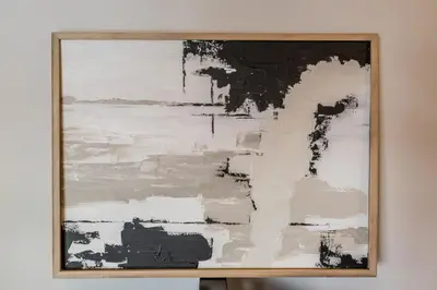 a picture of a painting on a wall at Hermoso departamento by Lofty in Cordoba
