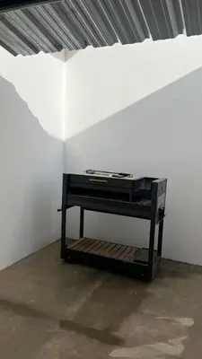 a table in a room with a white wall at MIGUEL JUAREZ 47 in Villa Carlos Paz
