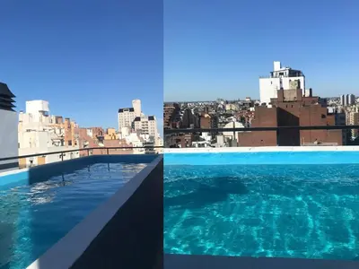 a view of the city from the rooftop of a building at Departamento equipado ideal para 4 en Nueva Córdoba in Cordoba