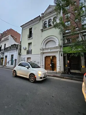 a white car parked in front of a building at CASONA REAL in Cordoba