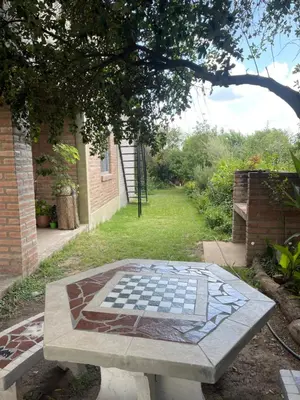 a table with a chess board on top of it at Santa Martina in Merlo