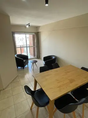 a dining room with a table and chairs at Bv San Juan - Nva Cba in Cordoba