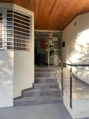 a set of stairs leading into a building at VENECIA céntrico con balcón in Villa Carlos Paz