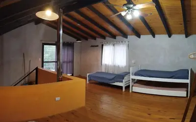 a bedroom with two bunk beds in a room at 