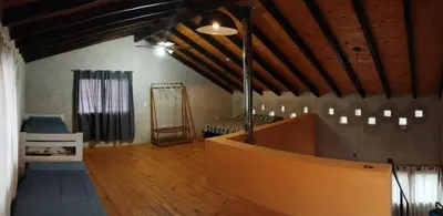 a room with a bed and a mirror in it at 