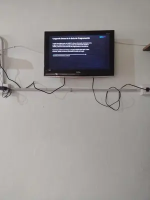 a flat screen tv sitting on top of a wall at El CAMPITO in La Ramada