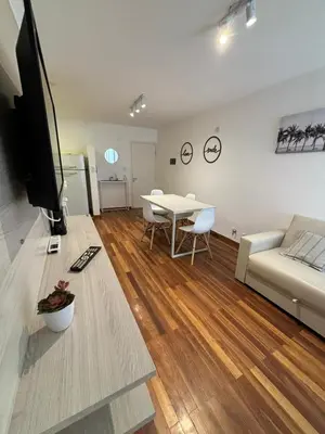 a living room with a couch and a table at Viaggiato Catamarca in Cordoba