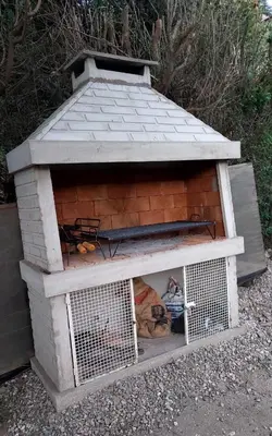 a dog house with stuffed animals inside of it at Don Edelmi in Villa Carlos Paz
