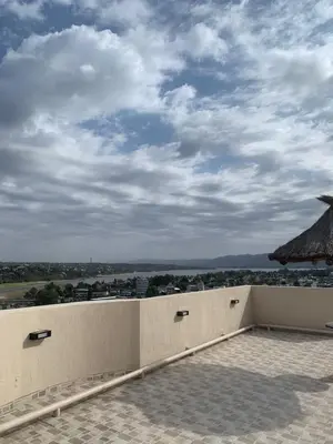 a view of the city from the roof of a building at Departamento boutiques, centrico in Villa Carlos Paz