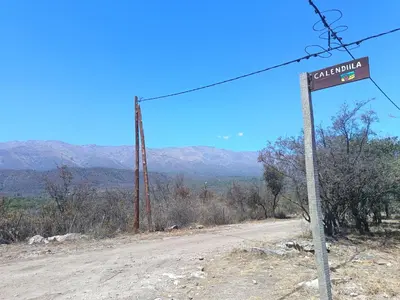a street sign on the side of a dirt road at Complejo Barranca Poceña in Quebrada de los Pozos