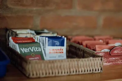 a basket filled with different types of food on a table at Cantonavi Cabañas in Mina Clavero