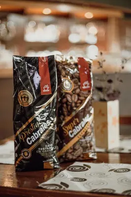 two bags of different types of snacks on a table at Cantonavi Cabañas in Mina Clavero