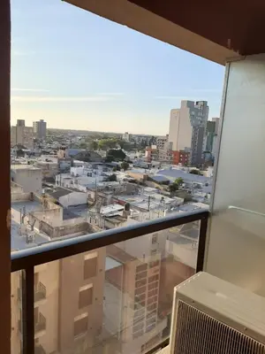 a view of a city from a window at Céntrico y totalmente equipado depto en Río Cuarto in Río Cuarto
