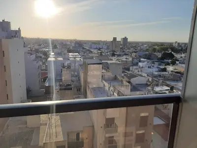 a view of a city from a window at Céntrico y totalmente equipado depto en Río Cuarto in Río Cuarto