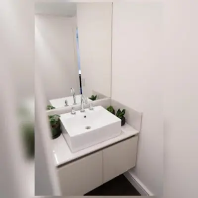 a bathroom with a white sink and a mirror at Ópera Park royal life in Cordoba
