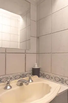 a bathroom with a sink and a mirror at Meraki Classic in Villa Carlos Paz