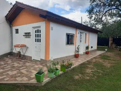 a small house with plants in front of it at El Marino in Merlo