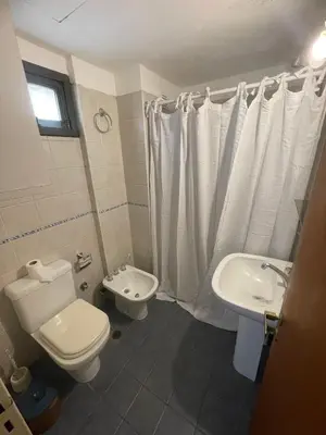 a bathroom with a toilet and a sink at Dpto p 3 en pleno Nva. Córdoba in Cordoba