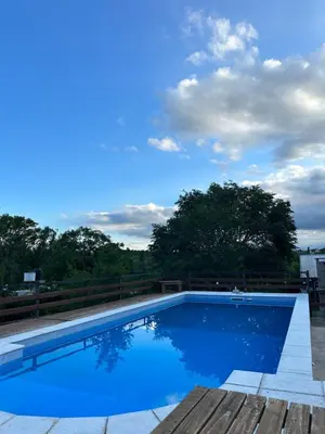 a swimming pool on top of a house at Cabañas Las Marias 1 in Cordoba