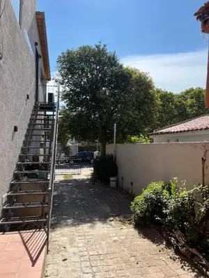 a set of stairs leading up to a building at Casa Beethoven in Villa Carlos Paz