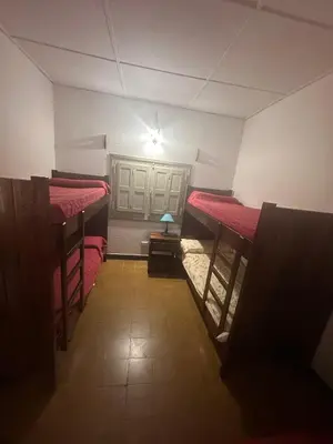 an overhead view of a room with two bunk beds at Tunquelen in Las Calles