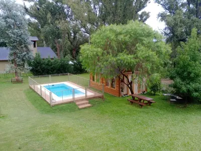 an overhead view of a swimming pool in a yard at Shakty 