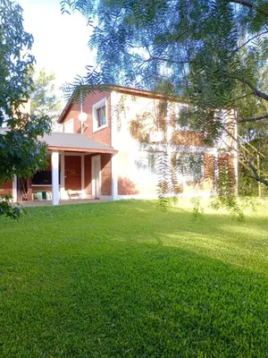 a house with a large lawn in front of it at Shakty 