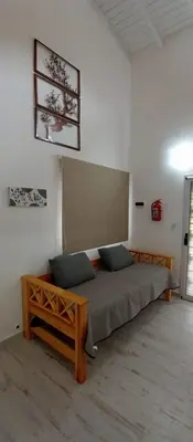 a bedroom with a large bed in a room at Schönes Loft in Villa General Belgrano
