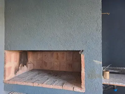 a brick oven in the side of a wall at La Casita Estanciera in Estancia Vieja