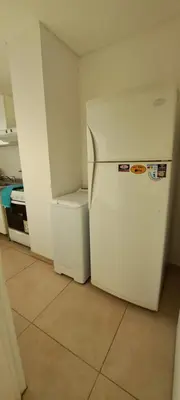 a white refrigerator and freezer in a room at Espacio C Montevideo con estacionamiento in Cordoba