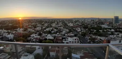 an aerial view of a city at sunset at Espacio C Montevideo con estacionamiento in Cordoba