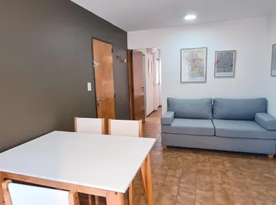 a living room with a couch and a table at Casa Nómada - Centro in Cordoba