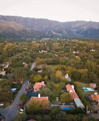 an aerial view of a town with trees and a road at Cabaña dpto en Villa de Merlo in Merlo