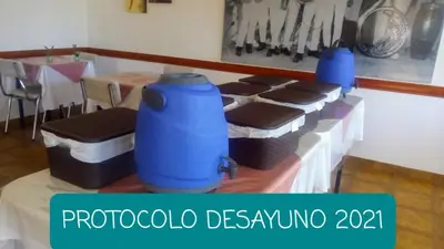a room with a table with blue drums on it at Hotel Car Mar in Mina Clavero