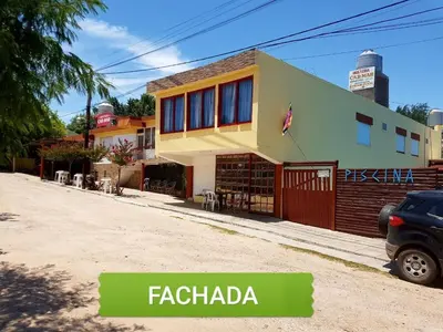 a house on a street with the words facienda at Hotel Car Mar in Mina Clavero