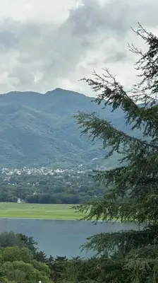 a view of a lake with mountains in the background at Casa vista panorámica al lago in Cordoba
