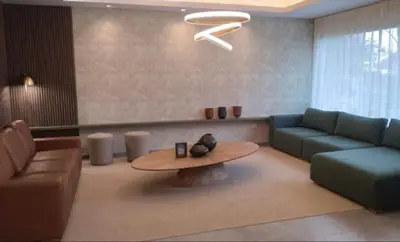 a living room with a couch and a table at Costanera Park in Cordoba