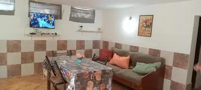 a living room with a couch and a table at El central in Tanti