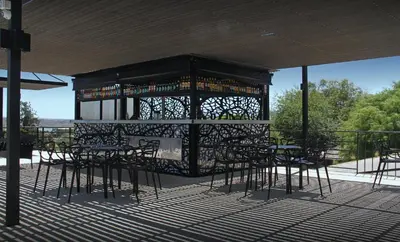 a group of tables and chairs on a patio at Pinares Panorama Suites, Spa & Convention Center in Villa Carlos Paz