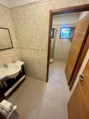 a bathroom with a sink and a mirror at CASA VILLA LAGO AZUL CARLOS PAZ in Villa Carlos Paz