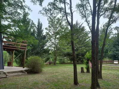 a park with a pavilion and trees at Alpinas La Linda in Villa General Belgrano