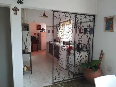 an open door to a kitchen with a kitchenasteryasteryasteryasteryasteryasteryastery at Alquiler temporario villa Carlos Paz in Villa Carlos Paz