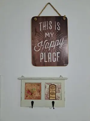 a sign that says this is my happy place on a wall at Departamento -Torre Duomo- a 50mts de la Terminal de Ómnibus de lado de Barrio Nueva Cordoba, By Apartcba in Cordoba