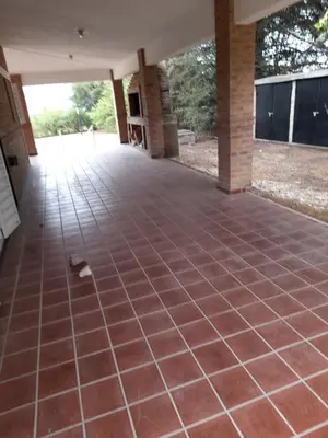 an empty room with a tiled floor in a building at Casa en Potrero de Garay in Potrero de Garay