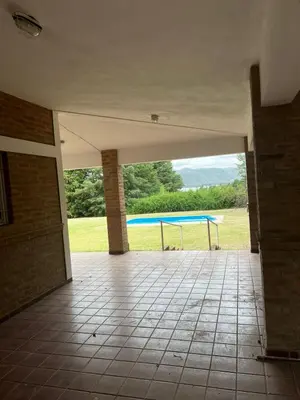a view of a pool from the inside of a building at Casa en Potrero de Garay in Potrero de Garay