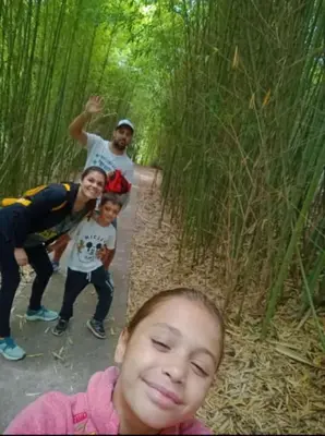 a group of people standing in a bamboo forest at Kapo TEAM , el zorzal in Villa Amancay