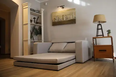 a living room with a couch and a table at Village Vistello in Cordoba