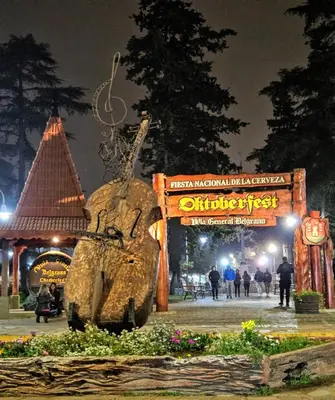 a statue of a rabbit in a park at night at Cabañas en Los Reartes Córdoba in Villa General Belgrano