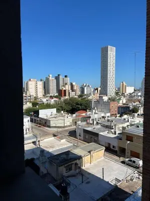 a view of a city from a building with buildings at Departamento equipado in Río Cuarto